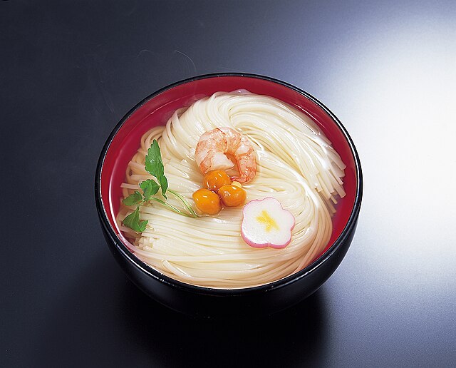 稲庭うどん (translated "Inaniwa Udon"): "Whispers of Silk and Serenity"
