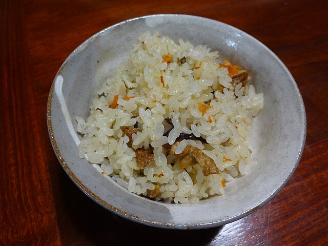 金魚めし (translated "Goldfish Rice"): "Whispers of the Golden Waters"