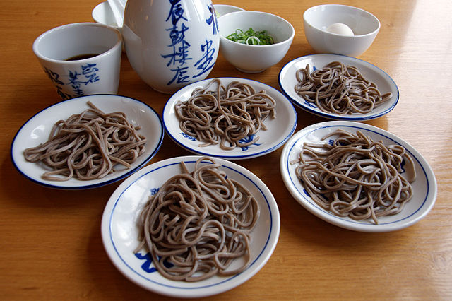 出石そば (translated "Izushi Soba"): "Whispers of Buckwheat in Serene Bowls"