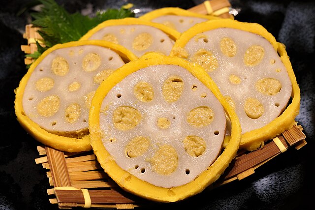 辛子蓮根 (translated "Spicy Lotus Root"): "Crimson Petals of Fire"