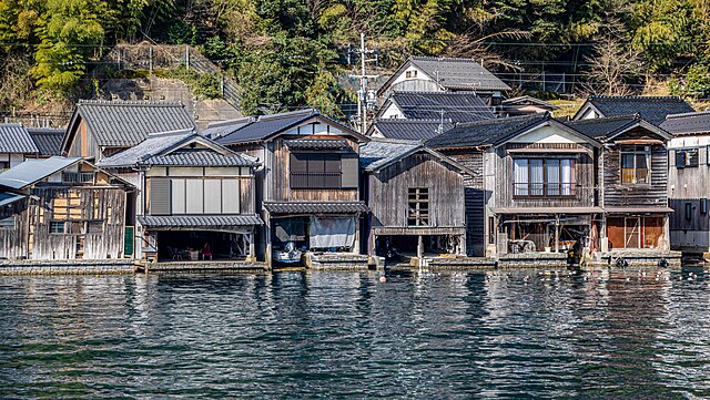 Ine's Tide-Cradled Boathouses