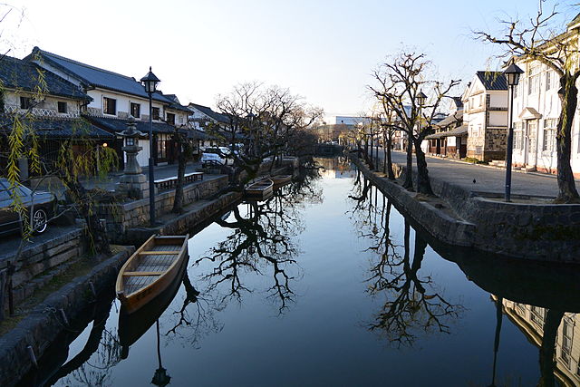 Willow Shadows on Kurashiki's White-Walled Canal
